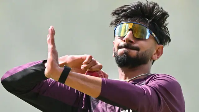 Shoaib Bashir prepares to bowl in the nets for England