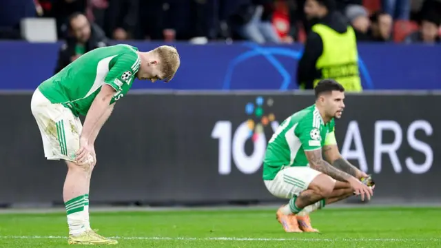 Lewis Hall and Bruno Guimaraes looking deflated after Bayer Leverkusen game