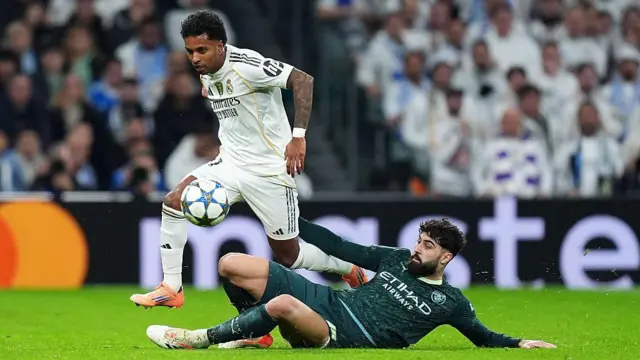 Josko Gvardiol challenges Rodrygo with a sliding tackle