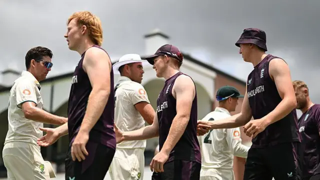 Australia A and England Lions players shake hands