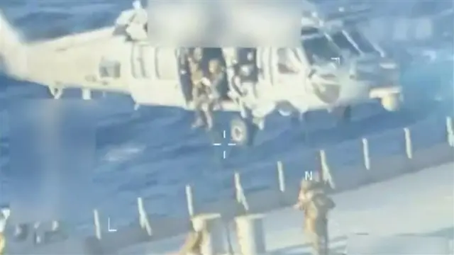 US troops board vessel near Venezuela from a helicopter