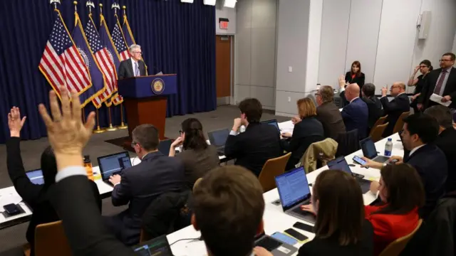 Jerome Powell addresses reporters at the Federal Reserve
