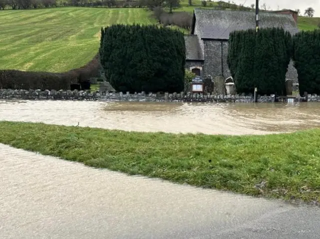 Water levels rise in the Welsh village of Nantmel in Radnorshire, Powys