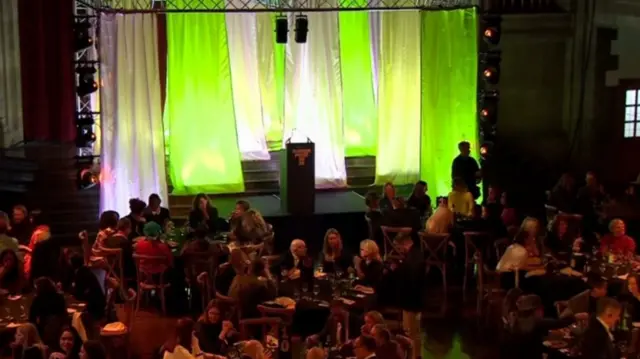 The stage is set for the Turner Prize ceremony. Attendees sit at tables