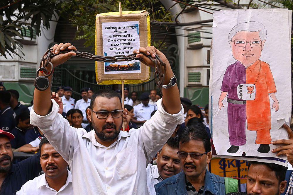 Members of the BLO Adhikar Raksha Committee took out the procession from College Square to Election Commission Office to protest against Special Intensive Revision (SIR) process claiming tremendous stress and workload on November 24, 2025 in Kolkata, India.