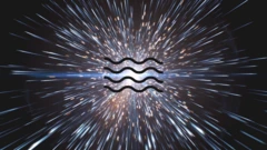 Imagen de rayos de luz que representan el cosmos, combinados con un símbolo de onda.