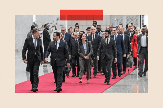 Syrian Minister of Foreign Affairs and Expatriates Asaad Al-Shaibani (front R) arrives to attend a reception with United Nations Security Council delegation at the Presidential Palace in Damascus on December 4, 2025
