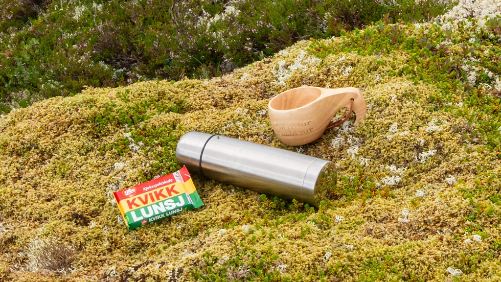 A bar of Kvikk Lunsj embedded in the snow Credit: (Alamy)