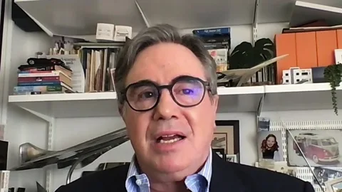 Wall Street holds steady