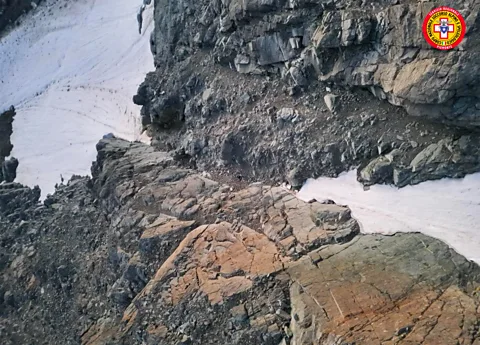 CNSAS Nicola Ivaldo's remains were eventually found partially obscured by snow in this gully after the AI spotted his red helmet (Credit: CNSAS)