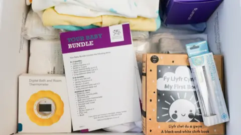 BBC Some of the items included in the free baby box