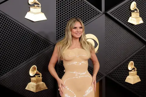 Getty Images Heidi Klum in a nude latex dress