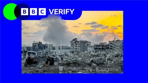 Smoke rises after Israeli airstrikes hit the Sabra neighborhood in southern Gaza City, leaving widespread destruction, on September 26, 2025.
