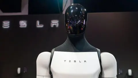 Tesla Optimus, also known as Tesla Bot general-purpose robotic humanoid on display at the AutoSalon press preview on January 09, 2026 in Brussels, Belgium.