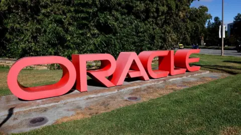 Oracle's red logo is visible outside its offices in Redwood City, California