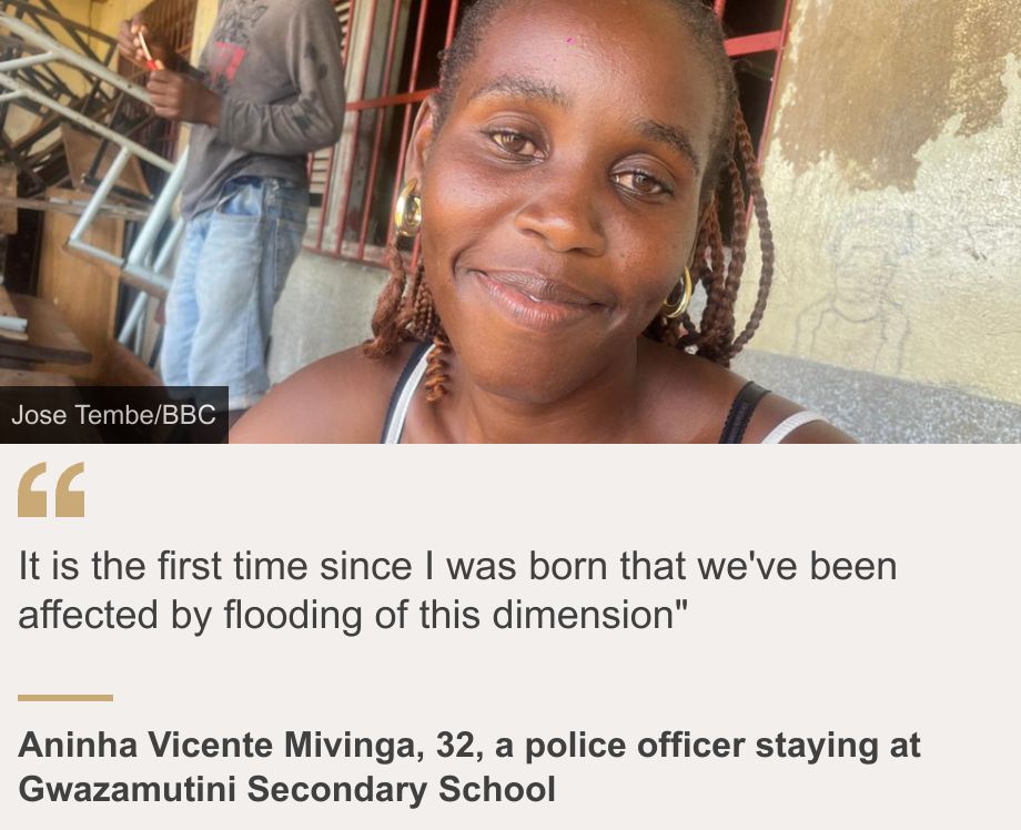 "It is the first time since I was born that we've been affected by flooding of this dimension"", Source: Aninha Vicente Mivinga, 32, a police officer staying at Gwazamutini Secondary School, Source description: , Image: 
